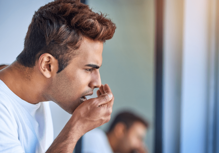 symptoms of bad breath